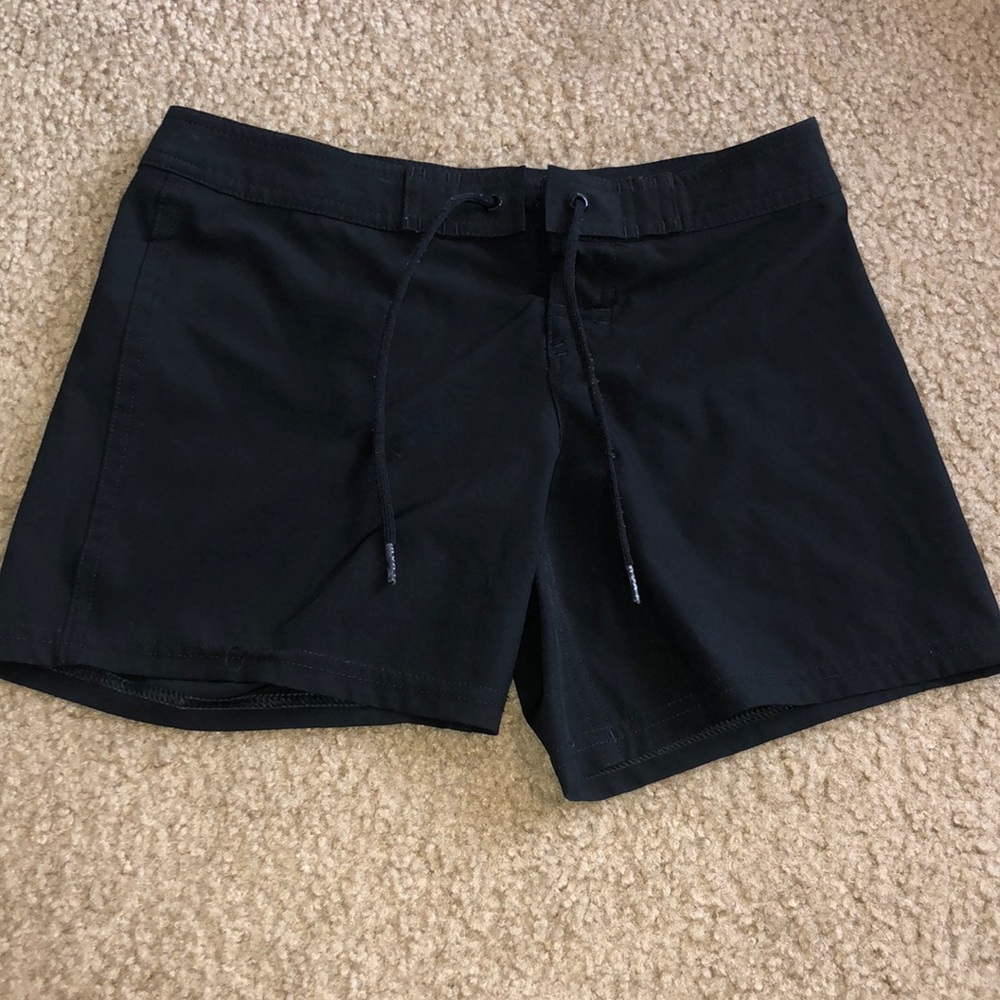 black swimming trunks
